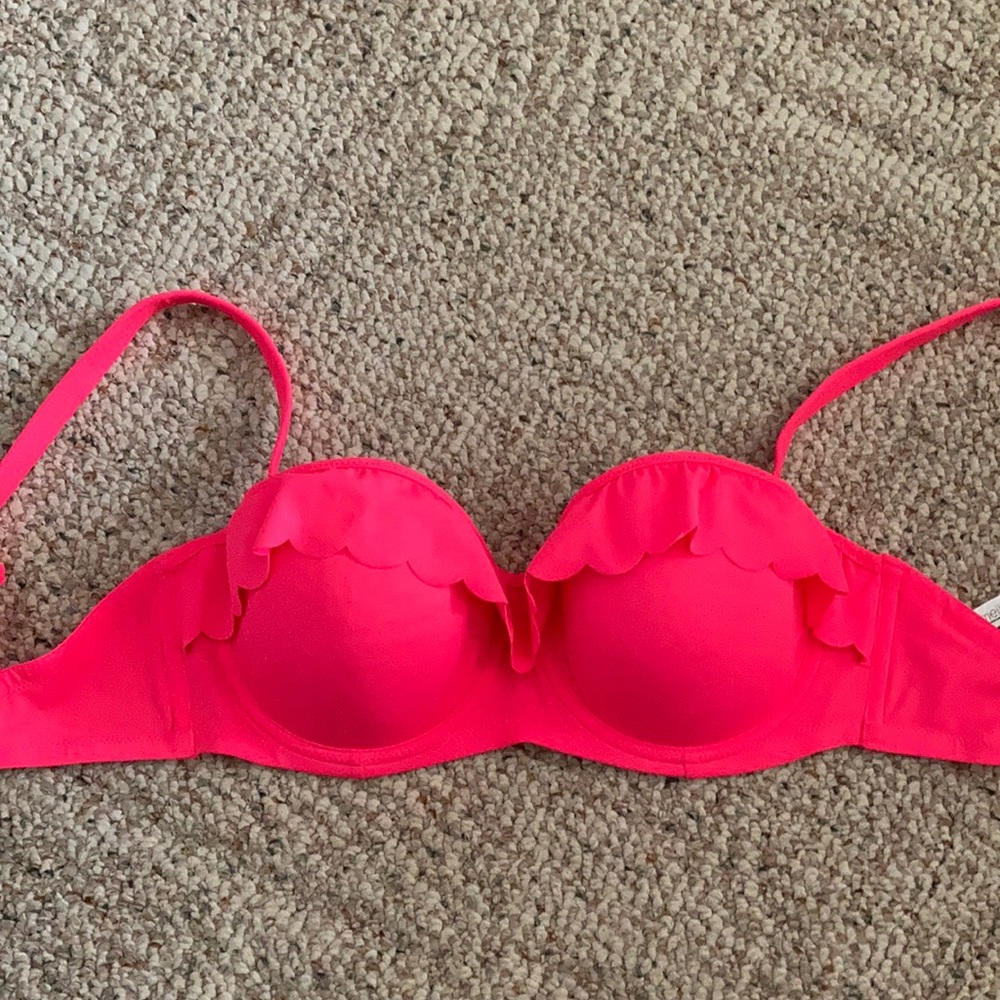 Ruffle trim under wire bikini top.